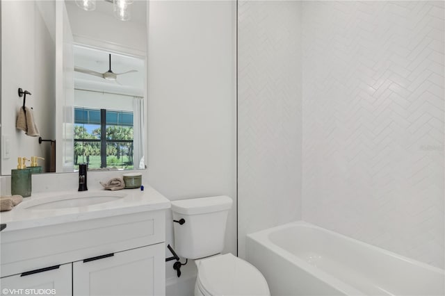 full bathroom featuring bathing tub / shower combination, vanity, and toilet