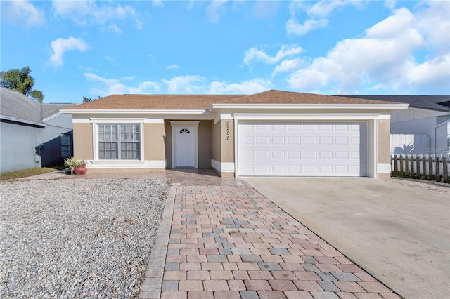 single story home with a garage