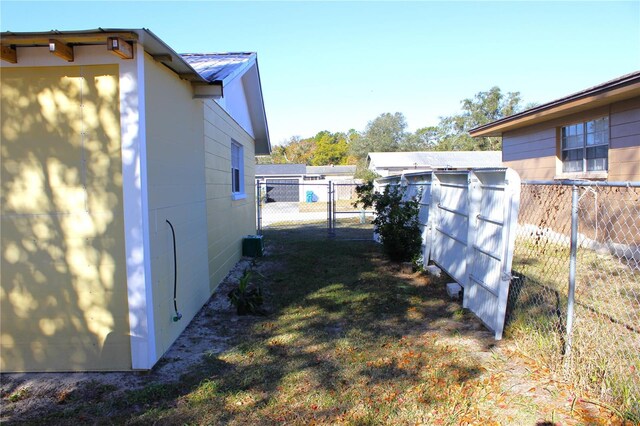 12663 Eddington Rd, Spring Hill, FL 34609 - view of yard with a gate