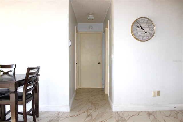 12663 Eddington Rd, Spring Hill, FL 34609 - hall with light marble finish floors and baseboards