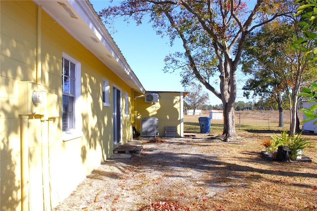 view of property exterior with cooling unit