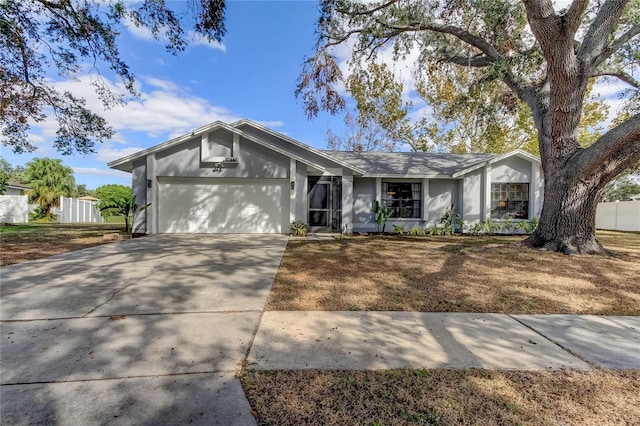 single story home with a garage