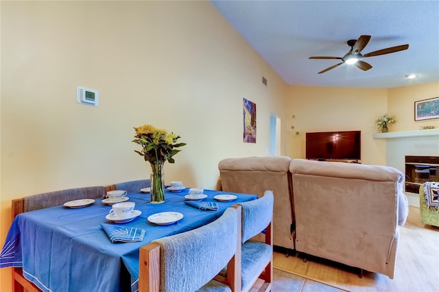 dining area featuring ceiling fan and light hardwood / wood-style floors