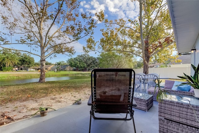 view of patio featuring a water view