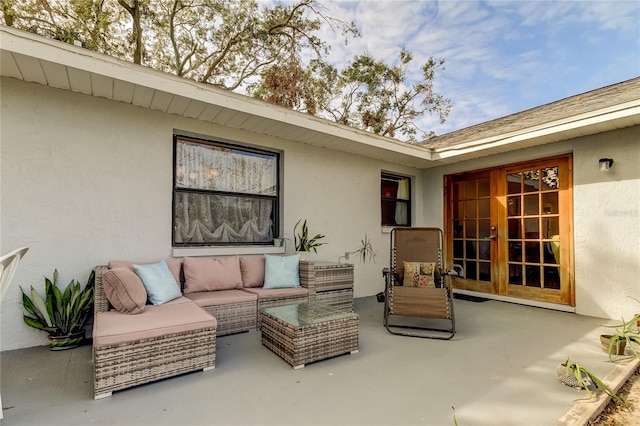 view of patio featuring french doors and an outdoor living space