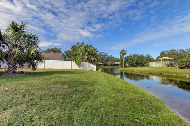 view of yard with a water view