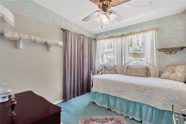 bedroom featuring ceiling fan and carpet floors