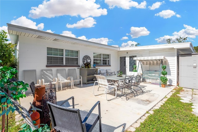 rear view of house with a patio area