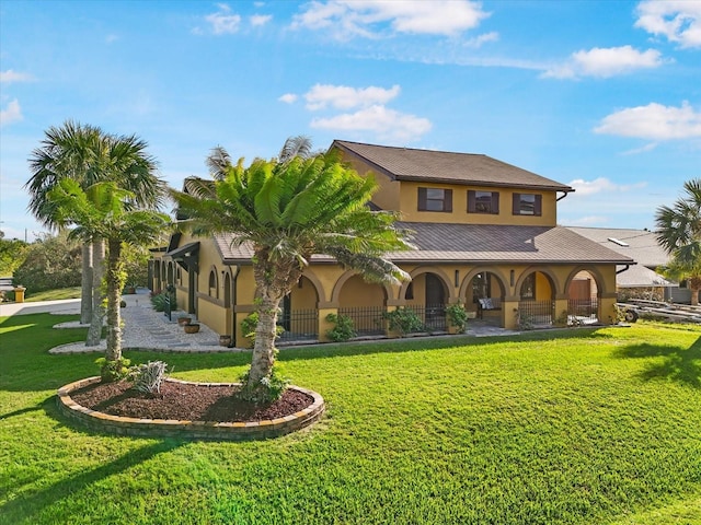 view of front facade with a front lawn