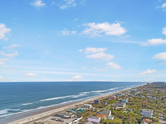 drone / aerial view with a view of the beach and a water view