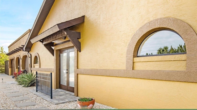 view of home's exterior with french doors