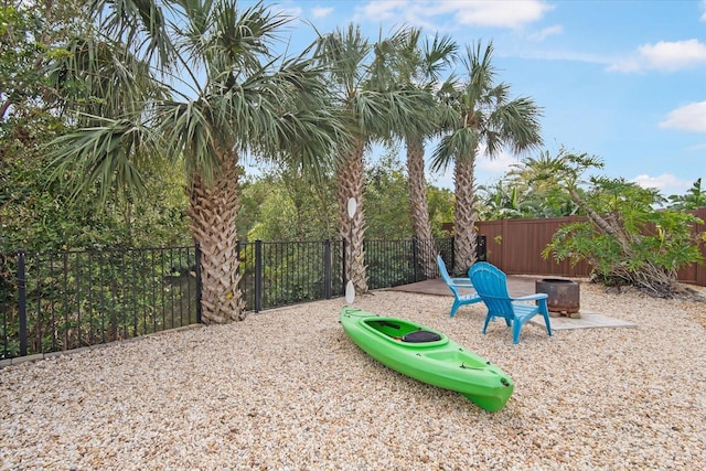 view of play area with an outdoor fire pit