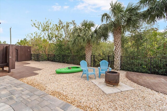 view of patio / terrace featuring a fire pit