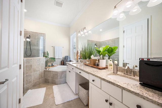 bathroom featuring tile patterned floors, crown molding, vanity, and independent shower and bath