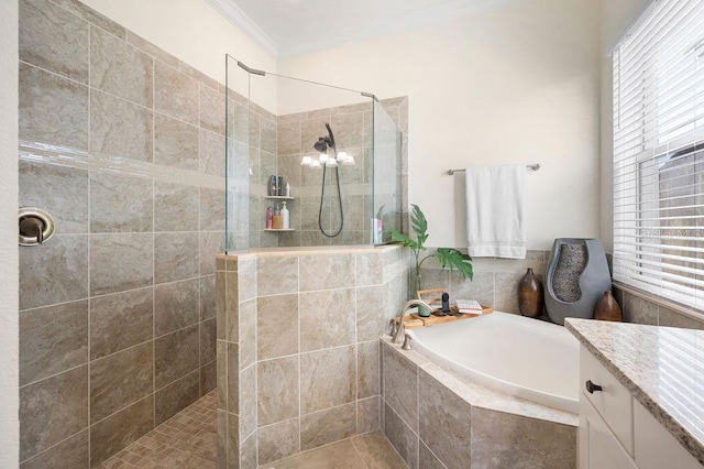 bathroom featuring vanity, ornamental molding, and independent shower and bath