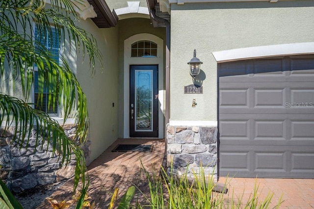 entrance to property with a garage