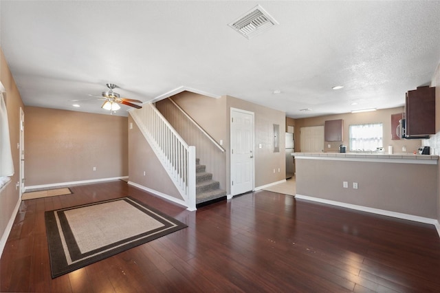 4148 Rudder Way, New Port Richey, FL 34652 - unfurnished living room with stairway, a ceiling fan, hardwood / wood-style floors, and recessed lighting