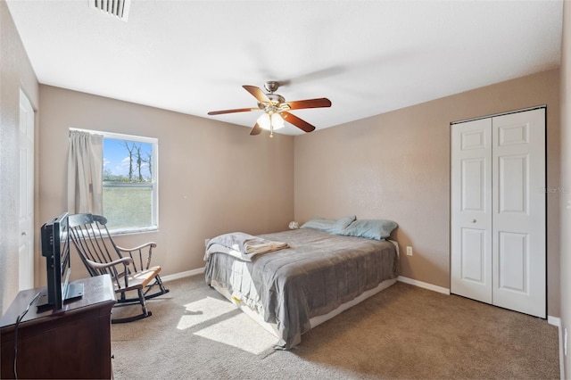 4148 Rudder Way, New Port Richey, FL 34652 - carpeted bedroom with ceiling fan and a closet