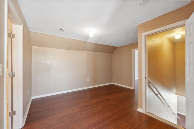 4148 Rudder Way, New Port Richey, FL 34652 - additional living space featuring dark wood-style floors and lofted ceiling