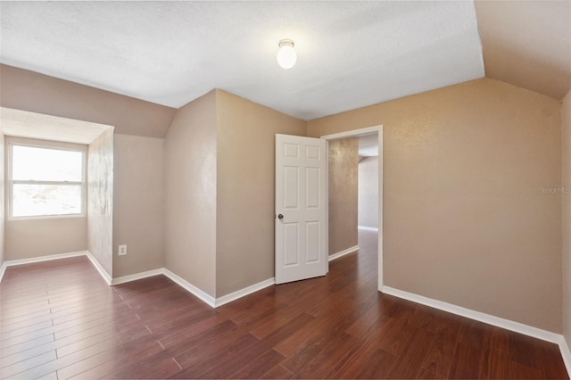 4148 Rudder Way, New Port Richey, FL 34652 - empty room with lofted ceiling and wood finished floors