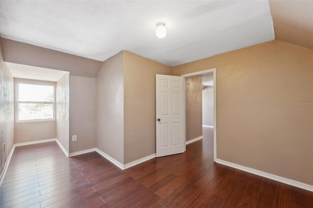 4148 Rudder Way, New Port Richey, FL 34652 - unfurnished room with vaulted ceiling and wood finished floors