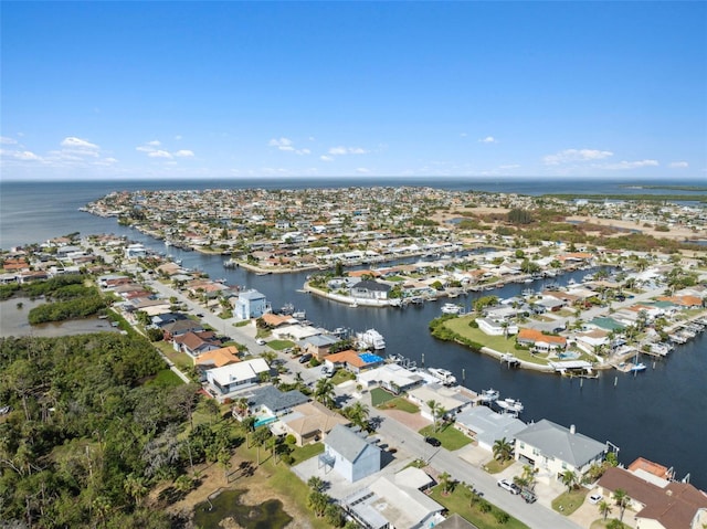4148 Rudder Way, New Port Richey, FL 34652 - aerial overview of property's location with a large body of water and nearby suburban area