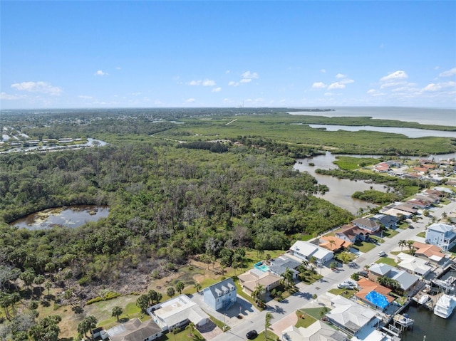 4148 Rudder Way, New Port Richey, FL 34652 - aerial view of property and surrounding area with a nearby body of water and nearby suburban area