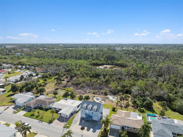 4148 Rudder Way, New Port Richey, FL 34652 - aerial view of residential area with a heavily wooded area
