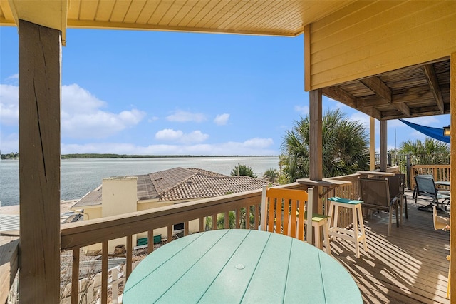 deck featuring a water view