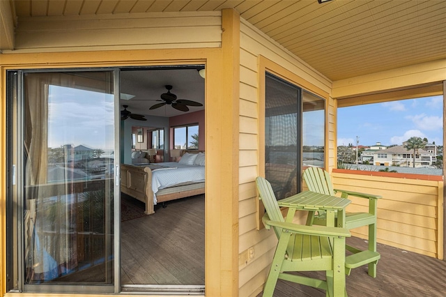 exterior space featuring ceiling fan