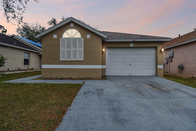 view of front of property featuring a garage