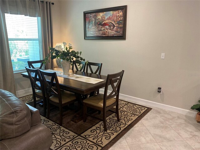 view of tiled dining area