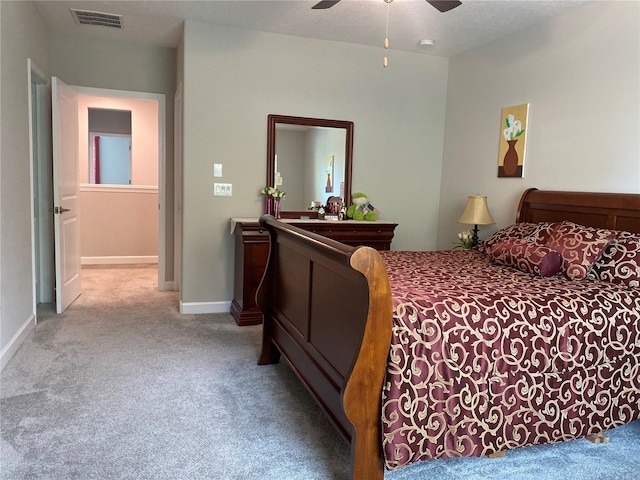 bedroom featuring ceiling fan and light colored carpet