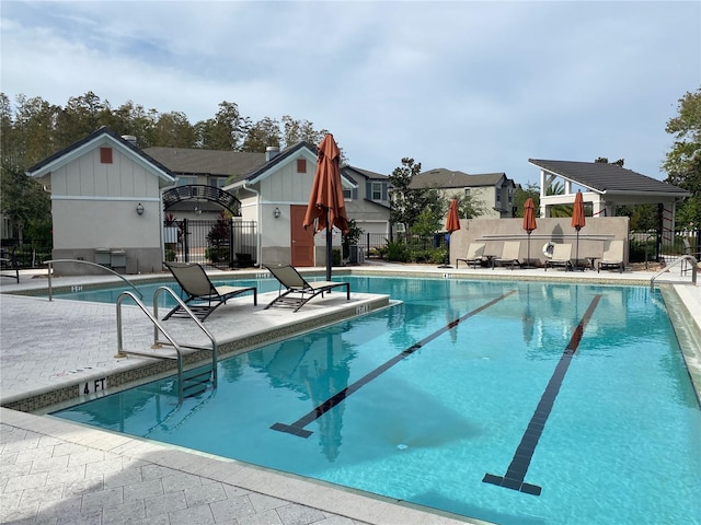 view of pool featuring a patio area