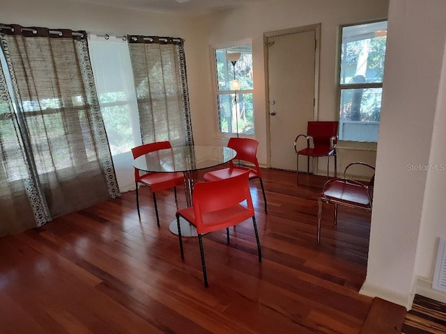 dining room with hardwood / wood-style floors