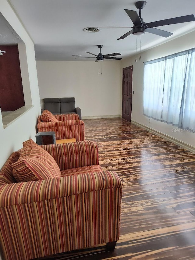 living room featuring ceiling fan