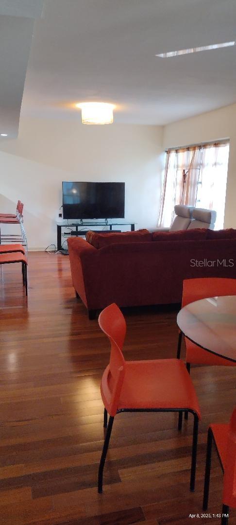 1182 Norwood Ave, Clearwater, FL 33756 - living area featuring wood finished floors