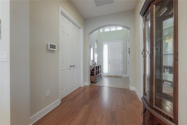 foyer entrance with wood-type flooring