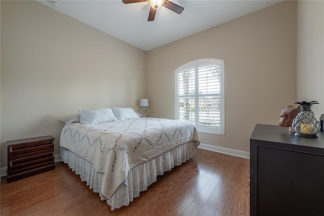 bedroom featuring hardwood / wood-style flooring and ceiling fan