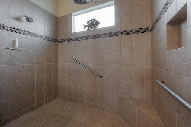 bathroom featuring a tile shower