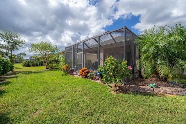 view of yard with a lanai