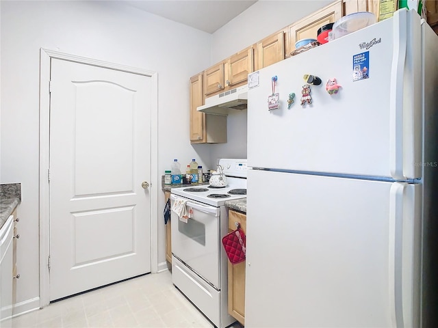 kitchen featuring white appliances and light brown cabinetry