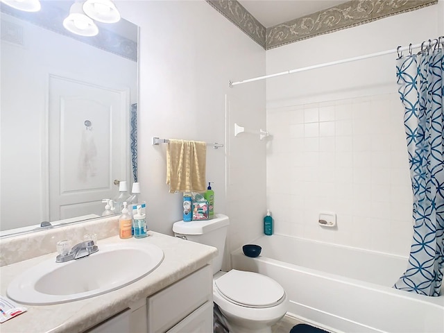 full bathroom featuring vanity, toilet, and shower / bathtub combination with curtain