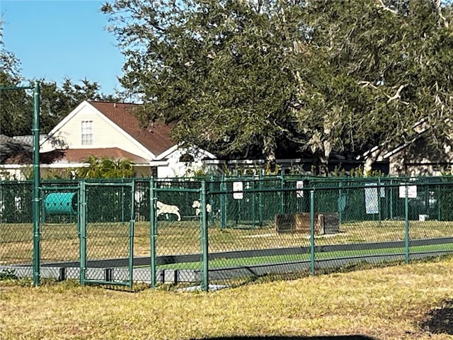 surrounding community featuring a yard