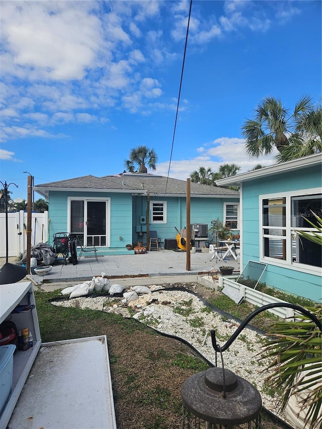 rear view of house featuring a patio area