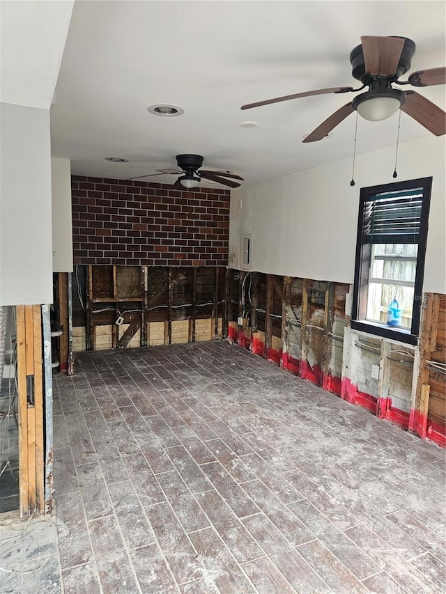 interior space featuring ceiling fan and hardwood / wood-style flooring