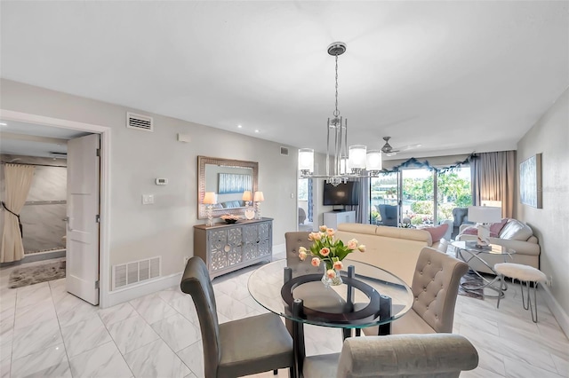 dining room featuring ceiling fan