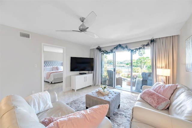 living room featuring ceiling fan