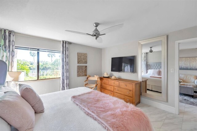 bedroom featuring ceiling fan