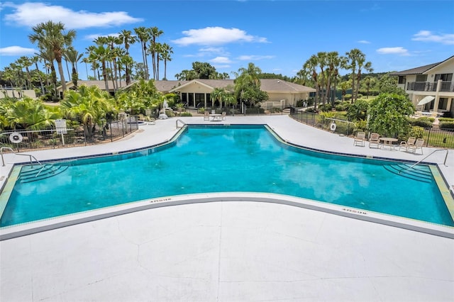 view of swimming pool with a patio area